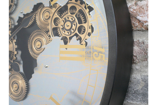 Wall Clock With Moving Cogs With Map Cut Out Design