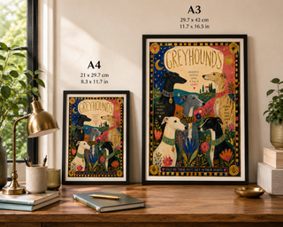 Two framed artworks of greyhounds on a wooden surface with measurements displayed.