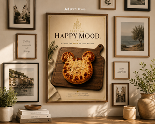 Wall art with a pizza on a cutting board and 'Happy Mood' text, surrounded by framed pictures and plants.